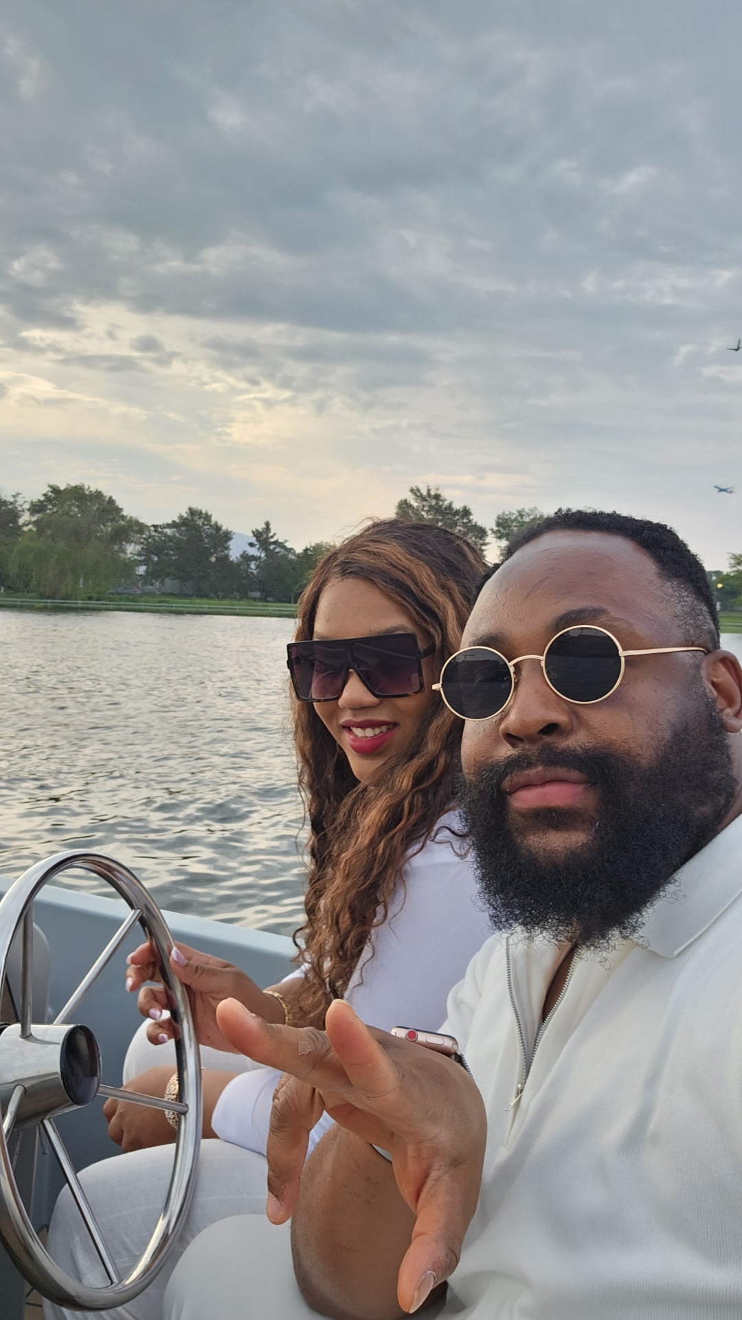 Tracey and Kevin on a boat at sunset
